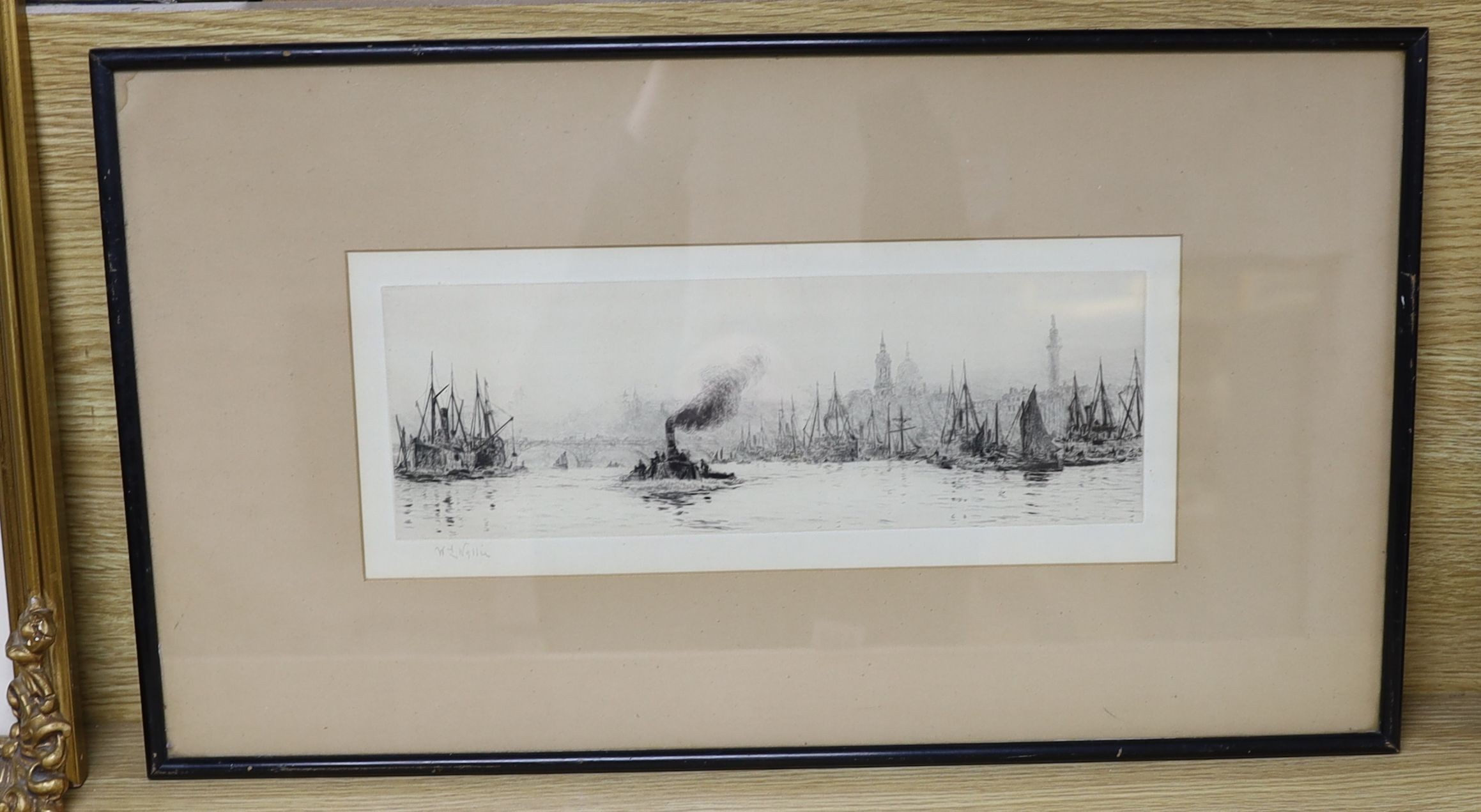 William Lionel Wyllie (1851-1931), etching, View along The Thames, signed in pencil, 11 x 33cm